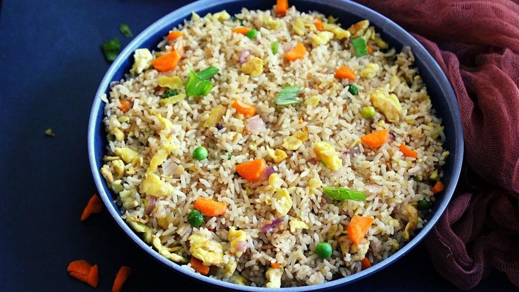'Video thumbnail for how to make hibachi fried rice with eggs and vegetables'