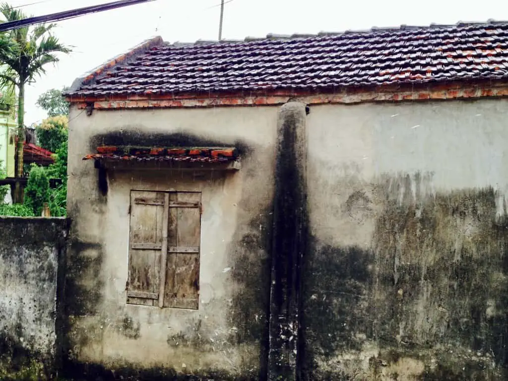 Wall of an older village house, outside Hanoi, Vietnam.  