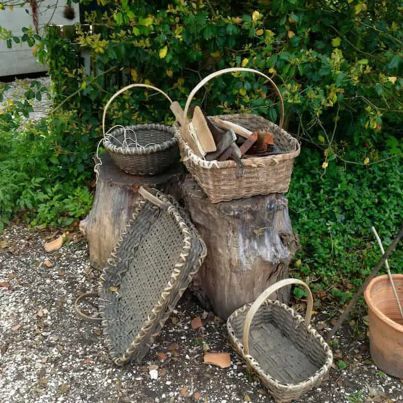 Some Old Baskets in a Garden at Colonial Williamsburg