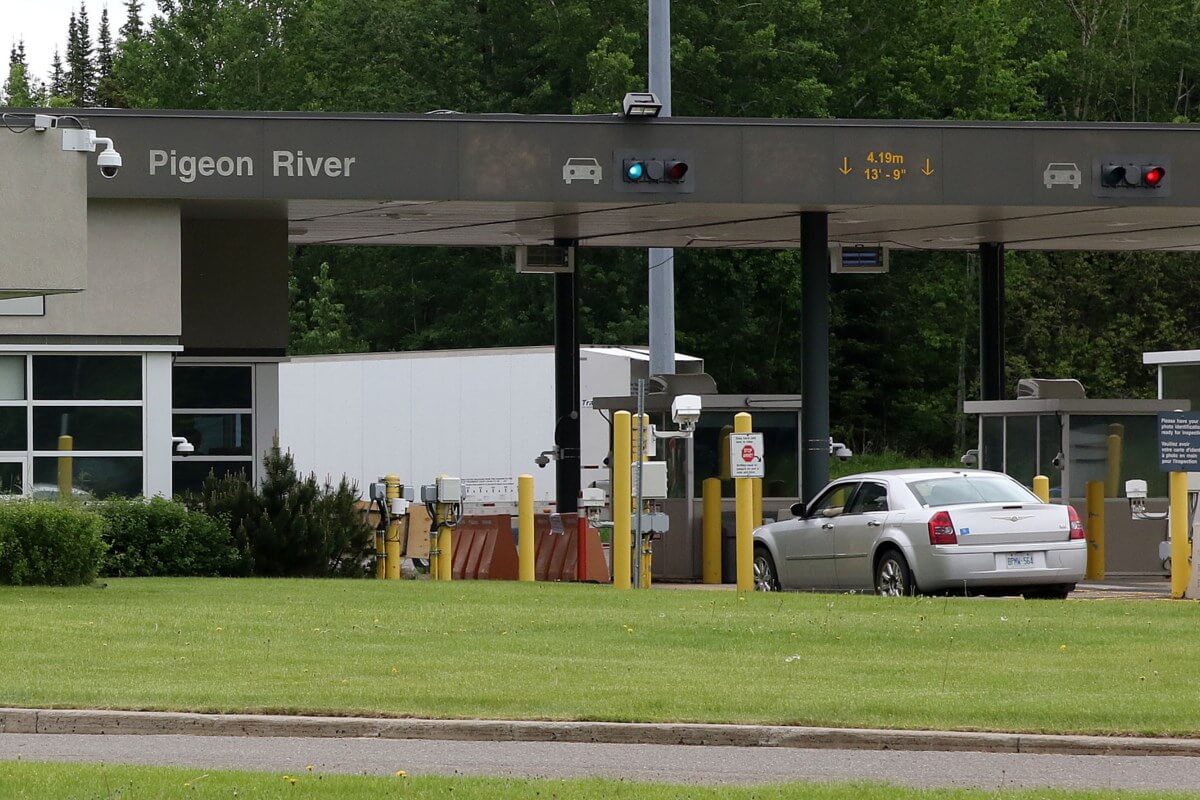 Does Wisconsin Border Canada? A Bus On a Dusty Road