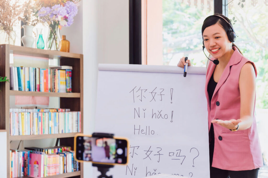 A Teacher Teaching A Chinese Language