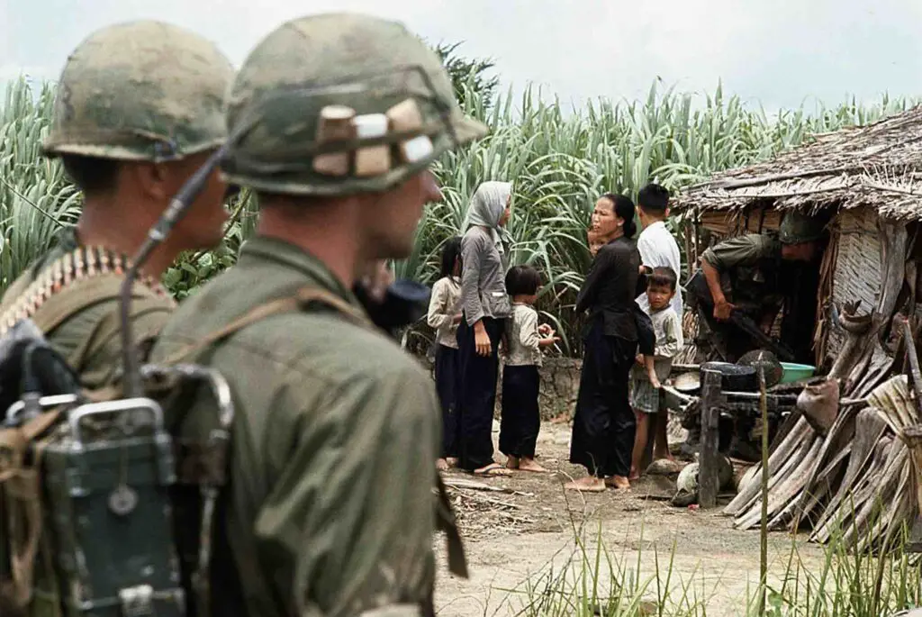 Vietnamese People With American Soldier During Vietnam War