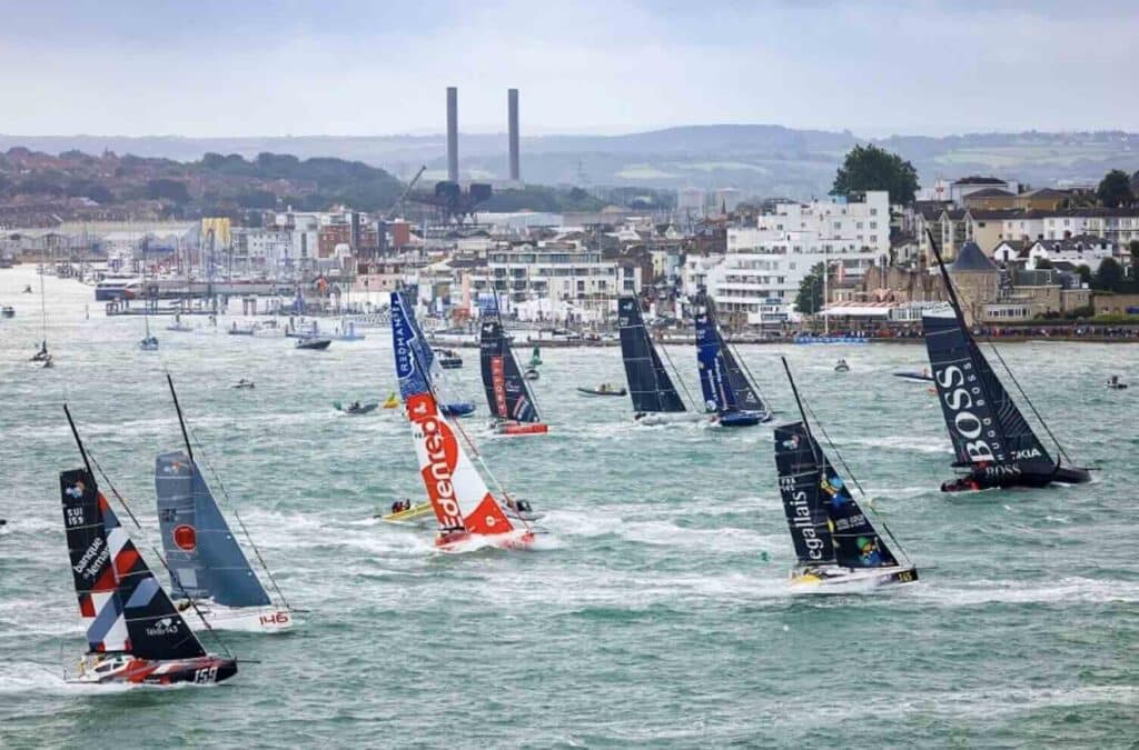 a group of sailboats in the water