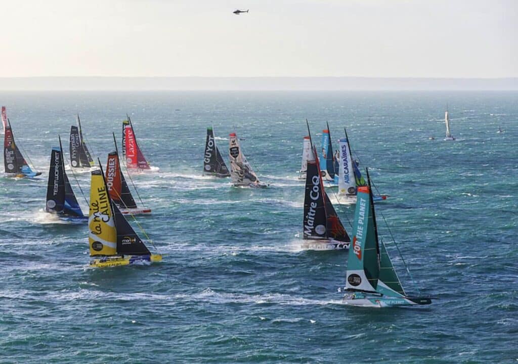 a group of sailboats in the water